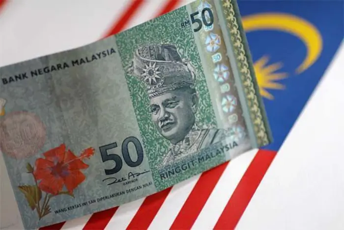 Ringgit rises to 4.39 on weaker dollar, US trade uncertainty.